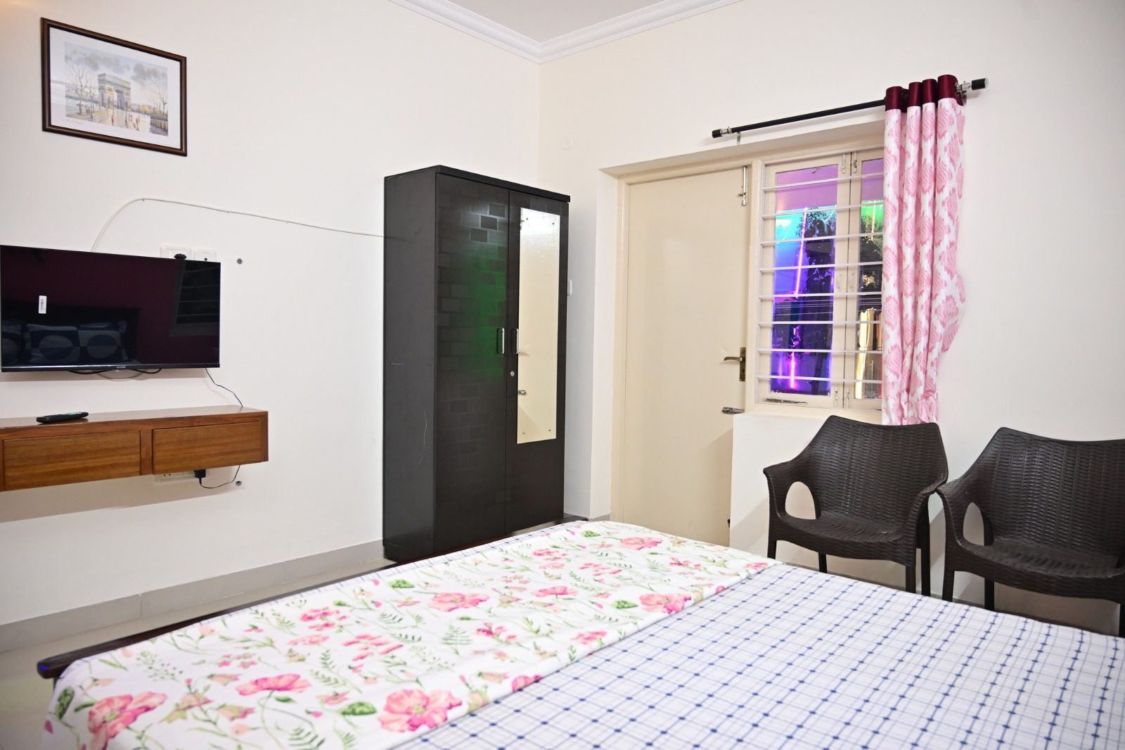 Bedroom three with wardrobe and television